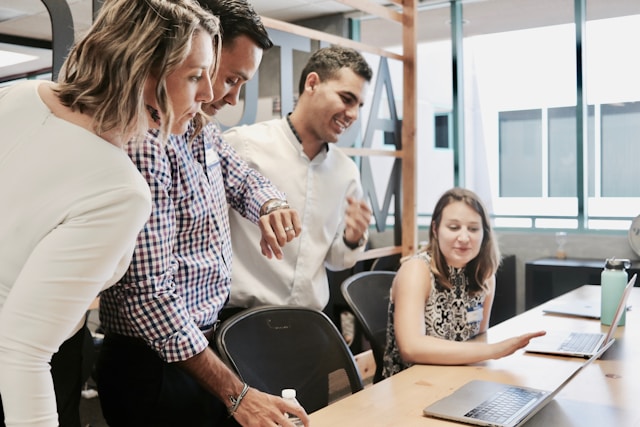 confident corporate professionals collaborating office