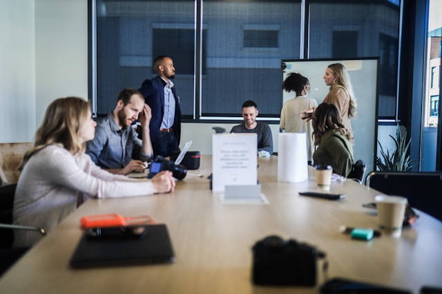 diverse young corporate professionals meeting