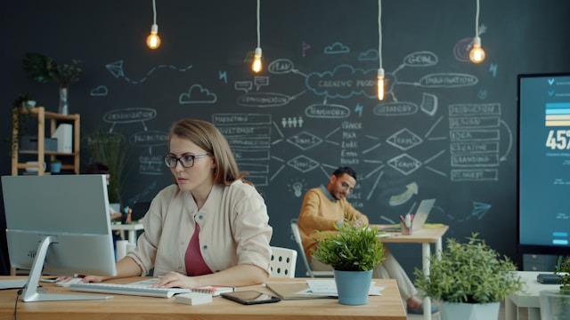 confident corporate analyst modern workspace